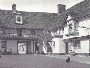 Late morning in the courtyard of The George inn at Huntingdon with a black cat enjoying the peace and quiet. ERIC G. MEADOWS 